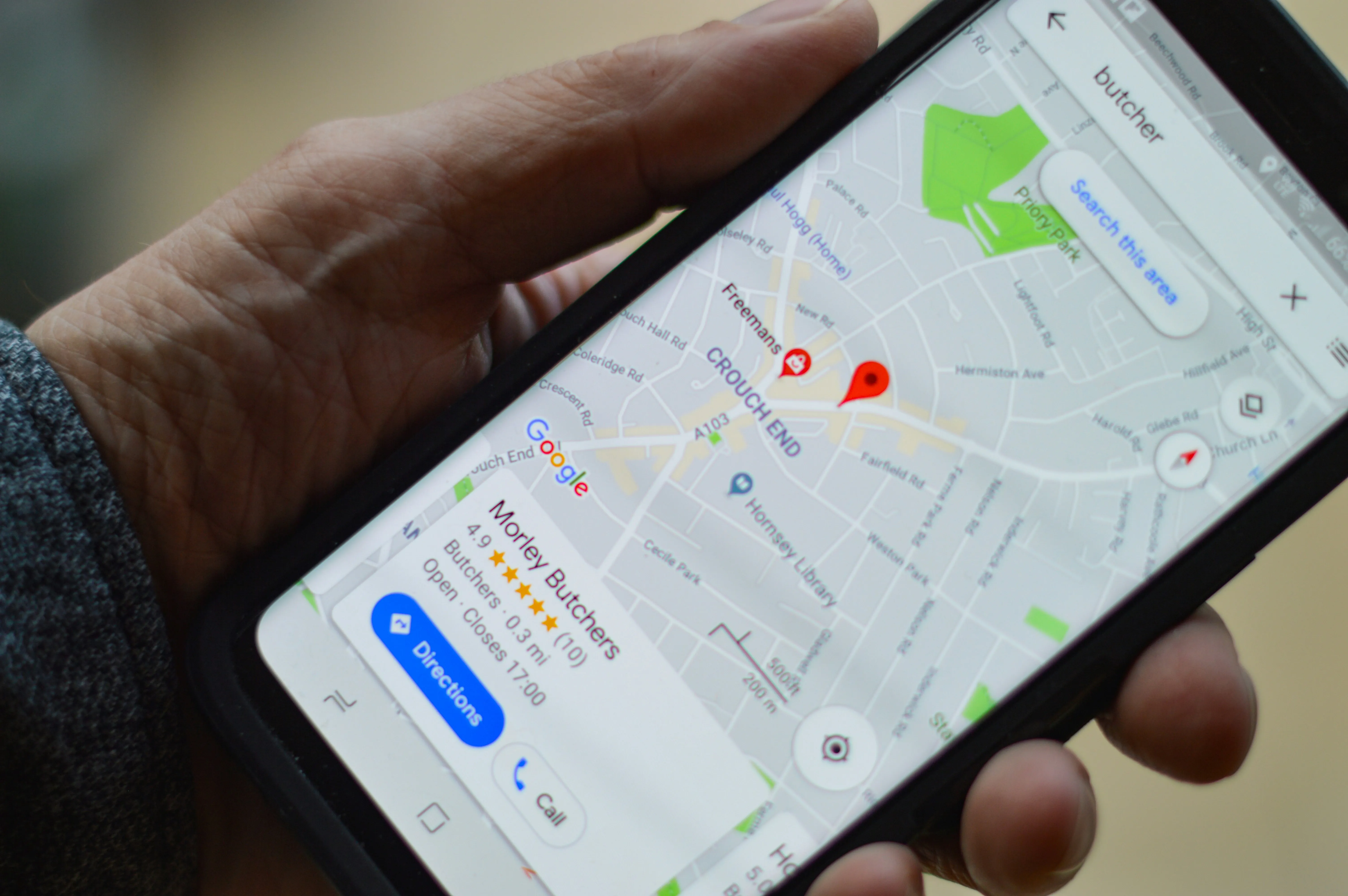 A user's iphone showing their search for a local businesses Google Business Profile.