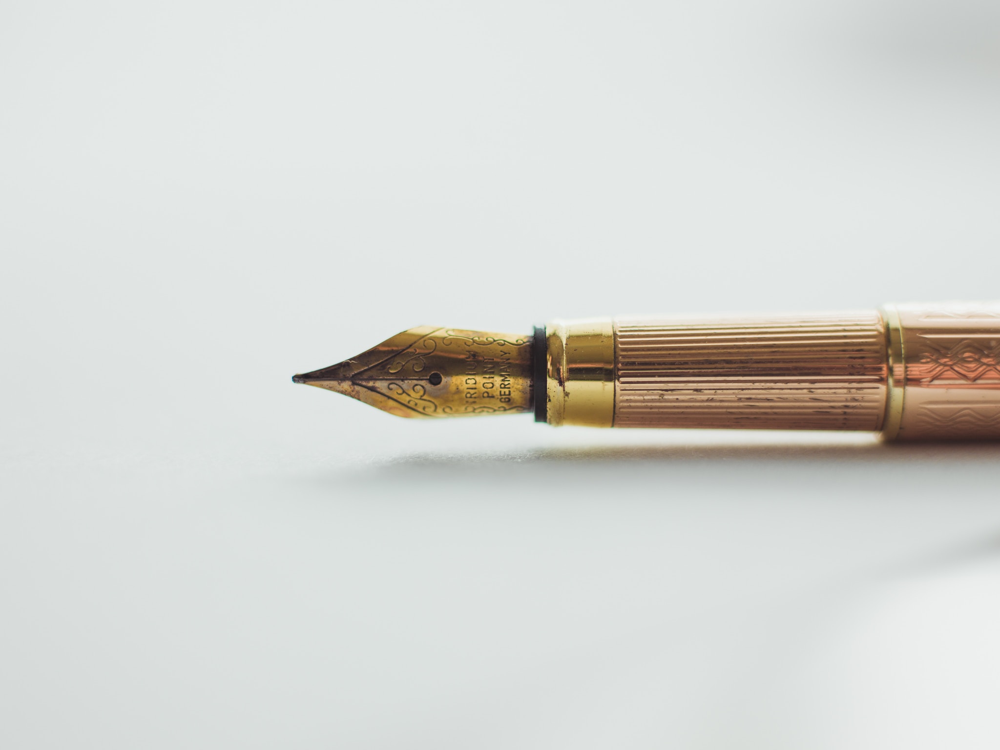 Pen ready to write SEO-optimized articles for HVAC on white background.