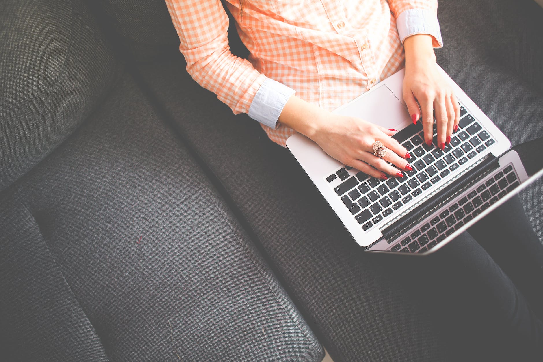 Blog writers for pest control business, woman expertly crafts content on laptop.